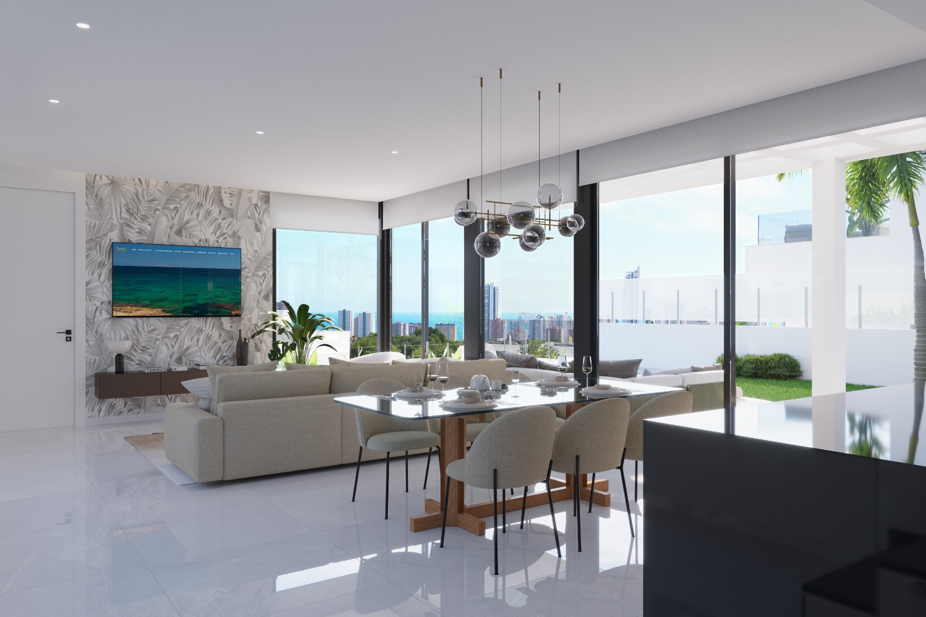 Kitchen with granite peninsula and integrated appliances in a Finestrat villa